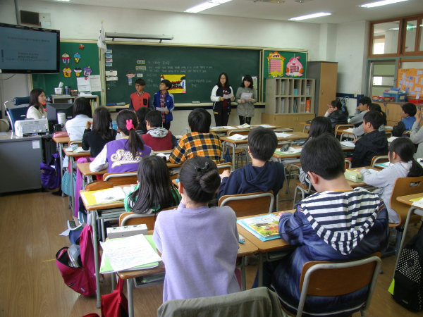 Students sitting in class for Scholar Academy marketing campaign